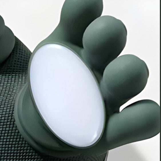 Green massage gun with a close-up of the head on a white background